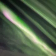 Green aurora streaks photographed by guest Tammy