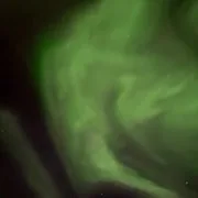 A spiral of green aurora photographed by guest Tammy